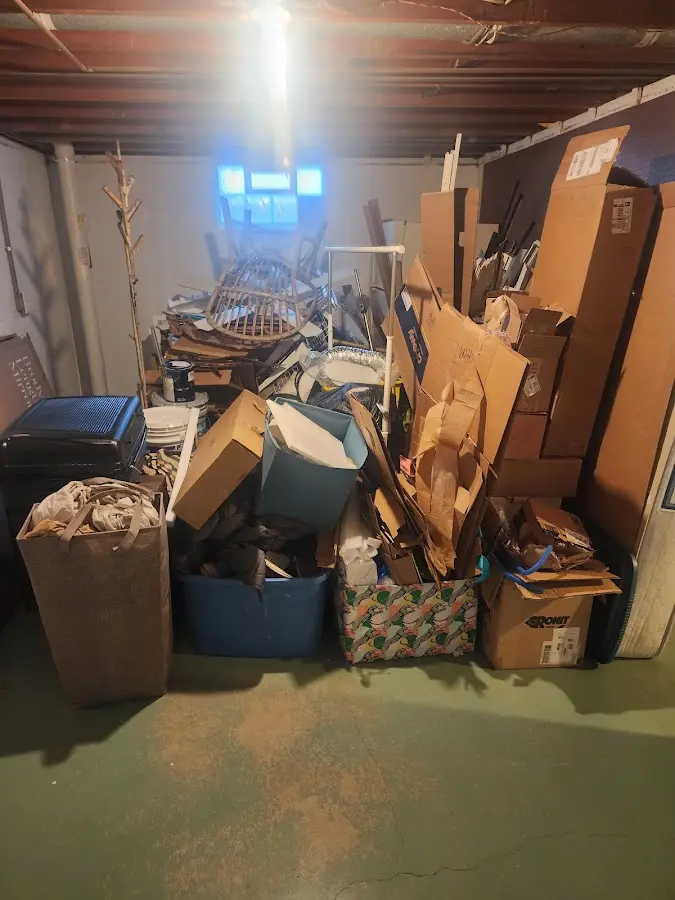 Roll-off dumpster container at job site for Concrete Dumpster Rental in Perkins